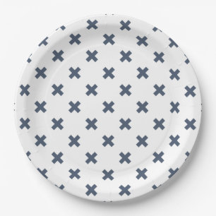 Blue-grey cross stitches on white paper plate