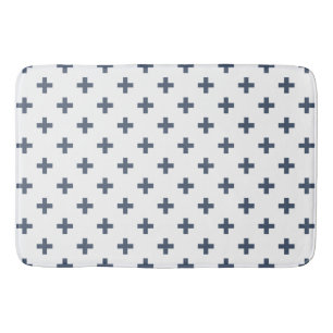 Blue-grey polka crosses on white bath mat