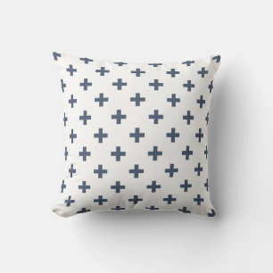 Blue-grey polka crosses on white cushion