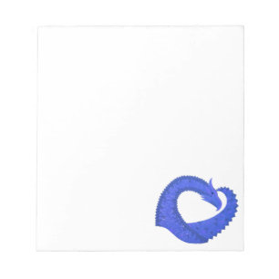 Blue heart dragon on white notepad