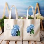 Blue Hydrangeas Wedding Monogrammed Tote Bag<br><div class="desc">Blue hydrangea flowers wedding tote bag.  Personalise with initials of the bride and groom with wedding date.  Light blue flowers on stems decorate both sides of this cotton tote.  Give as wedding thank you gifts to the bridal party,  parents,  and / or guests.</div>