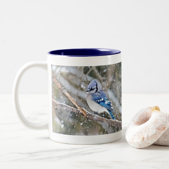 Blue Jay in a Snowstorm Two-Tone Coffee Mug (With Donut)