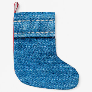 Blue jeans texture background. small christmas stocking