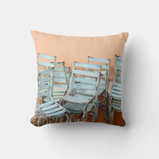 BLUE LADDERBACK CHAIRS NEAR BROWN PAINTED WALL CUSHION