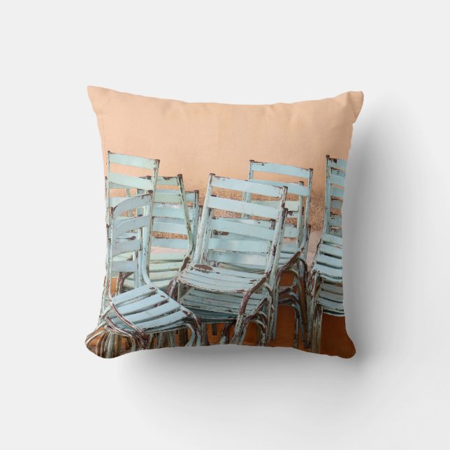 BLUE LADDERBACK CHAIRS NEAR BROWN PAINTED WALL CUSHION (Front)