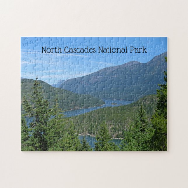 Blue Lake Winds Through Green Forested Mountains Jigsaw Puzzle (Horizontal)