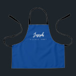 Blue Little Chef Script Name personalised Kids Apron<br><div class="desc">Make your little chef feel extra special with our Blue Little Chef Script Name Personalised Kids Apron. This apron is designed to provide a simple, chic, and elegant look, featuring stylish script typography for personalising the name. The purple background colour adds a touch of vibrancy and fun, perfect for engaging...</div>