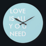 Blue Love is All You Need Custom White Text Large Clock<br><div class="desc">Blue and white "All you need is love" custom text template personalised round wall clock with quotes. Custom typography wall clock template, by red_dress, featuring the white text "Love is All you Need" on a blue customisable background. Easily personalise written text wall clocks with your favourite colours and quotes. Click...</div>