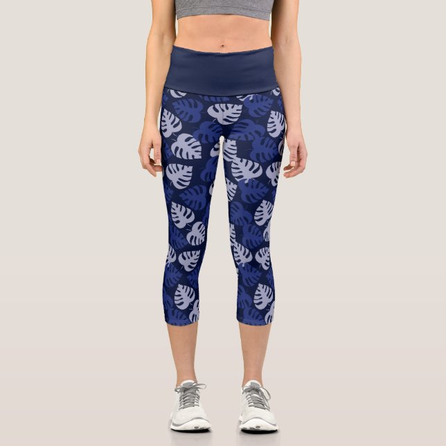 Blue monstera leaf pattern on deep navy capri leggings (Front)