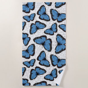 Blue morpho butterflies beach towel