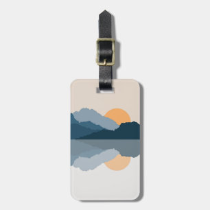 Blue mountains reflected in the lake luggage tag