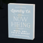 Blue Now Hiring Personalised Laundry Room Wooden Box Sign<br><div class="desc">Hang this personalised wood block in your laundry room and bring a little bit of that rustic farmhouse vibe to your home decor. Use the customise options to create a truly one of a kind print for yourself by changing the name font and the background colour from soft, duck egg...</div>