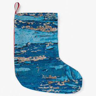 Blue old wooden background small christmas stocking
