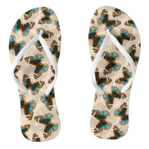 Blue Pansy Butterfly pattern on off white Flip Flops