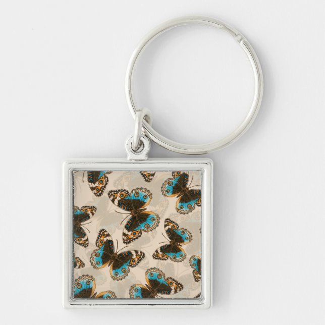 Blue Pansy Butterfly pattern on off white Key Ring (Front)