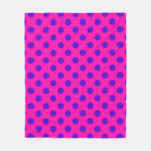 Blue polka dots on fuchsia fleece blanket