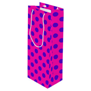 Blue polka dots on fuchsia wine gift bag