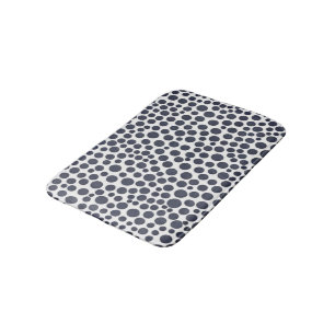 Blue polka dots on white bath mat
