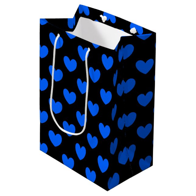 Blue polka hearts on black medium gift bag (Front Angled)