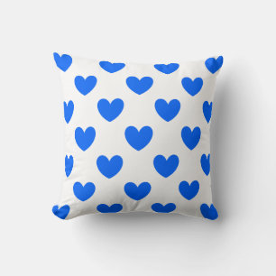 Blue polka hearts on white cushion