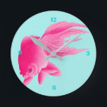 Blue Pop Art Pink Goldfish Modern Round Clock<br><div class="desc">A pink goldfish on a block of blue solid colour. 
A large image of a fish to colour your walls or as a unique wall clock.</div>