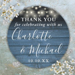 Blue Rustic String Lights Wedding Favour Thank You Classic Round Sticker<br><div class="desc">Rustic signature script wedding favour thank you classic round sticker featuring pretty string lights and signature style names on a blue wood panels background. Personalise with your special thank you information in chic white typography. Designed by Thisisnotme©</div>