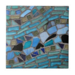 Blue Sea Glass Mosaic Tile<br><div class="desc">A turquoise blue mosaic with black,  blue,  light green,  gold,  grey,  and white coloured sea glass.</div>