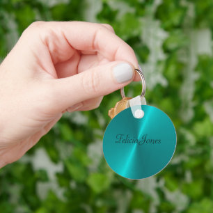 Blue shiny faux metal monogram key ring