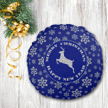 Blue Silver Snowflake Reindeer Round Cushion<br><div class="desc">This festive Christmas pillow features a silver snowflake pattern on dark royal blue background. The matching blue centre has a silver reindeer image in the centre of text that says Merry Christmas and Happy New Year. The other side has the same snowflake pattern, but without the circle or reindeer text....</div>