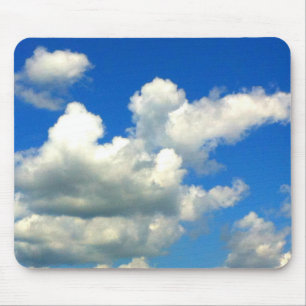 Blue skies white fluffy clouds mouse mat