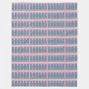 Blue skis on pink blanket