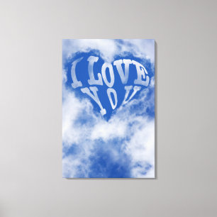 Blue sky heart surrounded by cloud. I love you Canvas Print