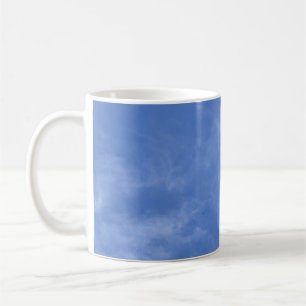 blue sky with small clouds coffee mug