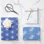 Blue Snowflake Wrapping Paper Sheet<br><div class="desc">Three styles of icy blue snowflakes on different shades of blue or white for a three part wrapping paper set you can use for any winter holiday.</div>