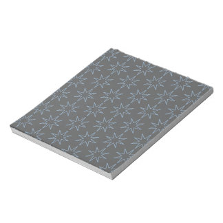 Blue Star Outline on Grey Notepad