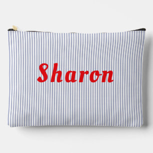 Blue striped, red letters accessory pouch. pouch