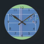 Blue Tennis Court Modern Tennis Player      Round Clock<br><div class="desc">Personalised classic tennis court design in blue with classic, chic, preppy & elegant tennis rackets and green tennis balls. Simple, minimalist gift for your tennis coach or tennis team. Personalised Gift for a tennis player. Blue tennis court illustration. Trendy tennis players home decor. Trendy modern tennis player gifts. Cool retro...</div>