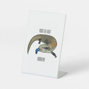 Blue-tongued skink cartoon illustration pedestal sign