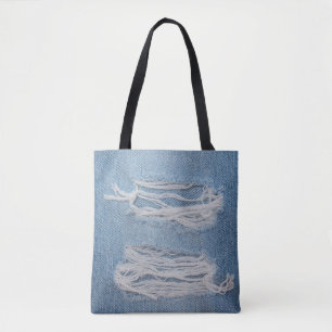 Blue torn denim jeans texture background. Stylish, Tote Bag