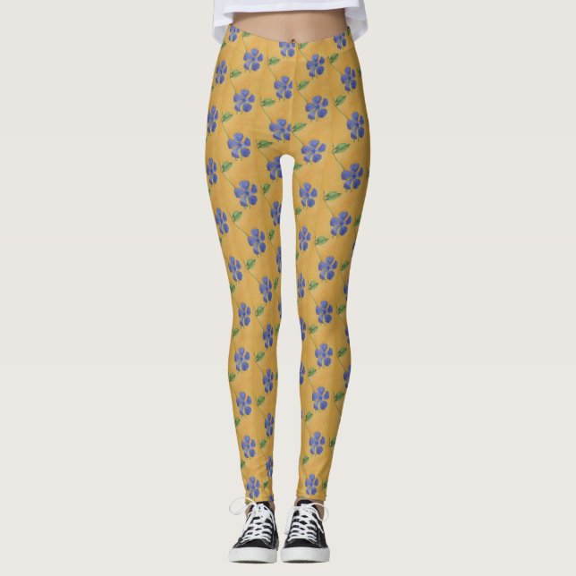 Blue vinca, periwinkle on a yellow background leggings (Front)
