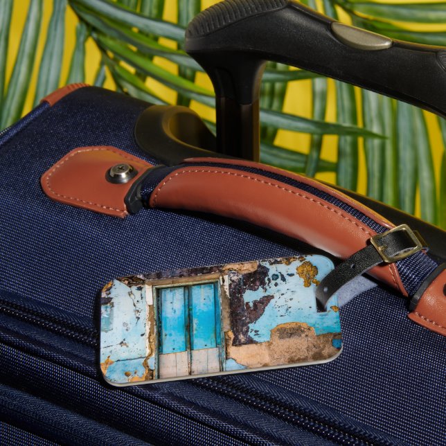 Blue wall and door luggage tag (Front Insitu 3)