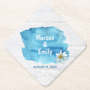 blue watercolor splash on wood with water lily paper coaster