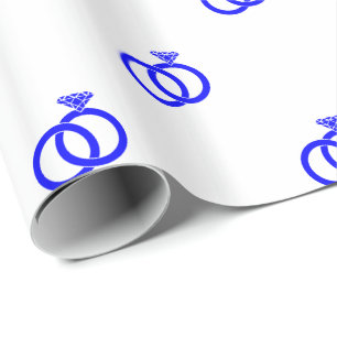 Blue Wedding Rings on White Wrapping Paper