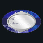 Blue White Holiday Custom Gift Tag Stickers<br><div class="desc">This custom gift tag has script letters on a silver medallion against winter holiday art with an elegant pattern of pine boughs and pinecones in blue and white on an icy background of blues and violet.</div>