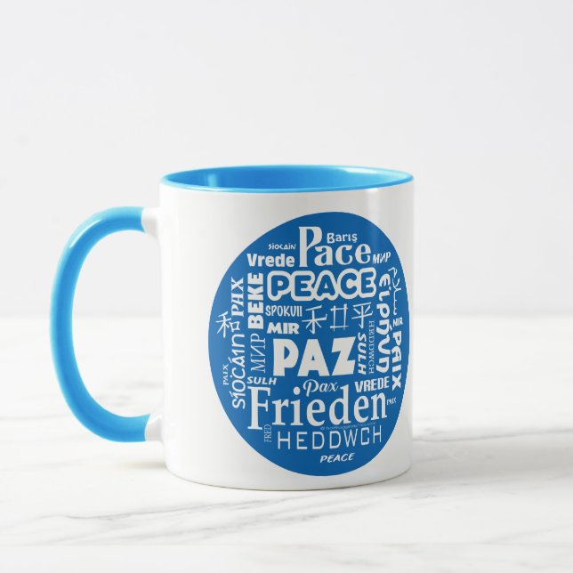 Blue/white styled mug peace in multiple languages (Left)