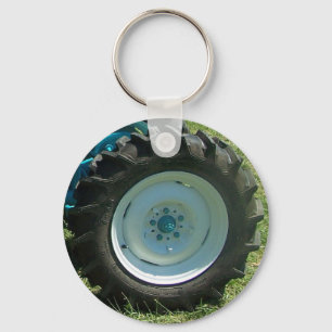blue white tractor wheel key ring
