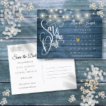 Blue Wood String Lights Calendar Save the Date Announcement Postcard<br><div class="desc">This stylish save the date card features pretty string lights, a calendar and a chic gold love heart highlighting your special date on a blue rustic wood background. The reverse has additional save the date details, including your wedding website, with your return address and space for your recipient's address. Designed...</div>