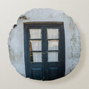 BLUE WOODEN DOOR PANEL IN WHITE BUILDING ROUND CUSHION