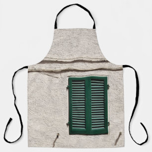 BLUE WOODEN WINDOW ON WHITE CONCRETE WALL APRON