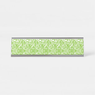 Blue wrapping paper with a repetitive white snowfl desk name plate